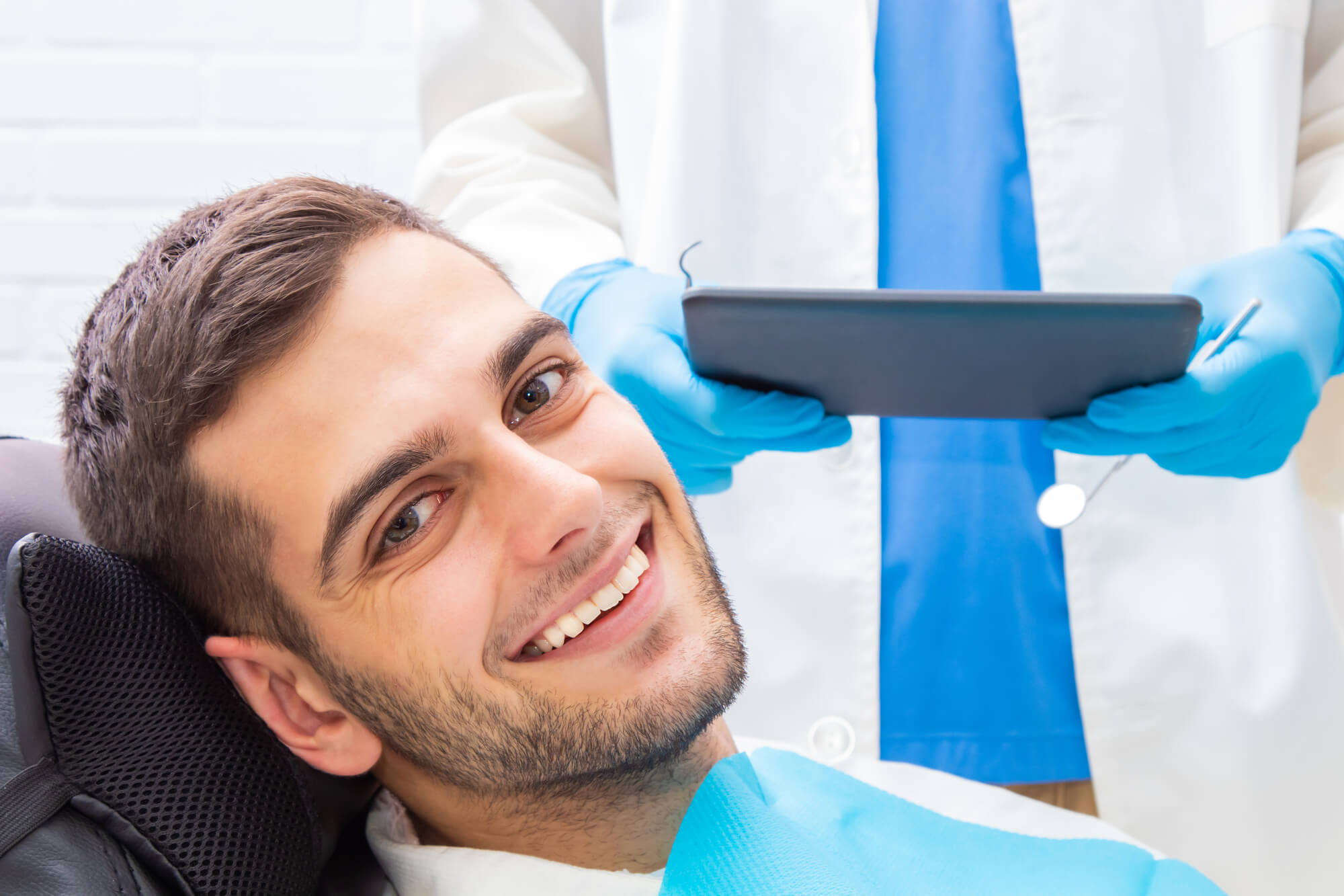 man smiling after getting new Dental Implants Boca Raton