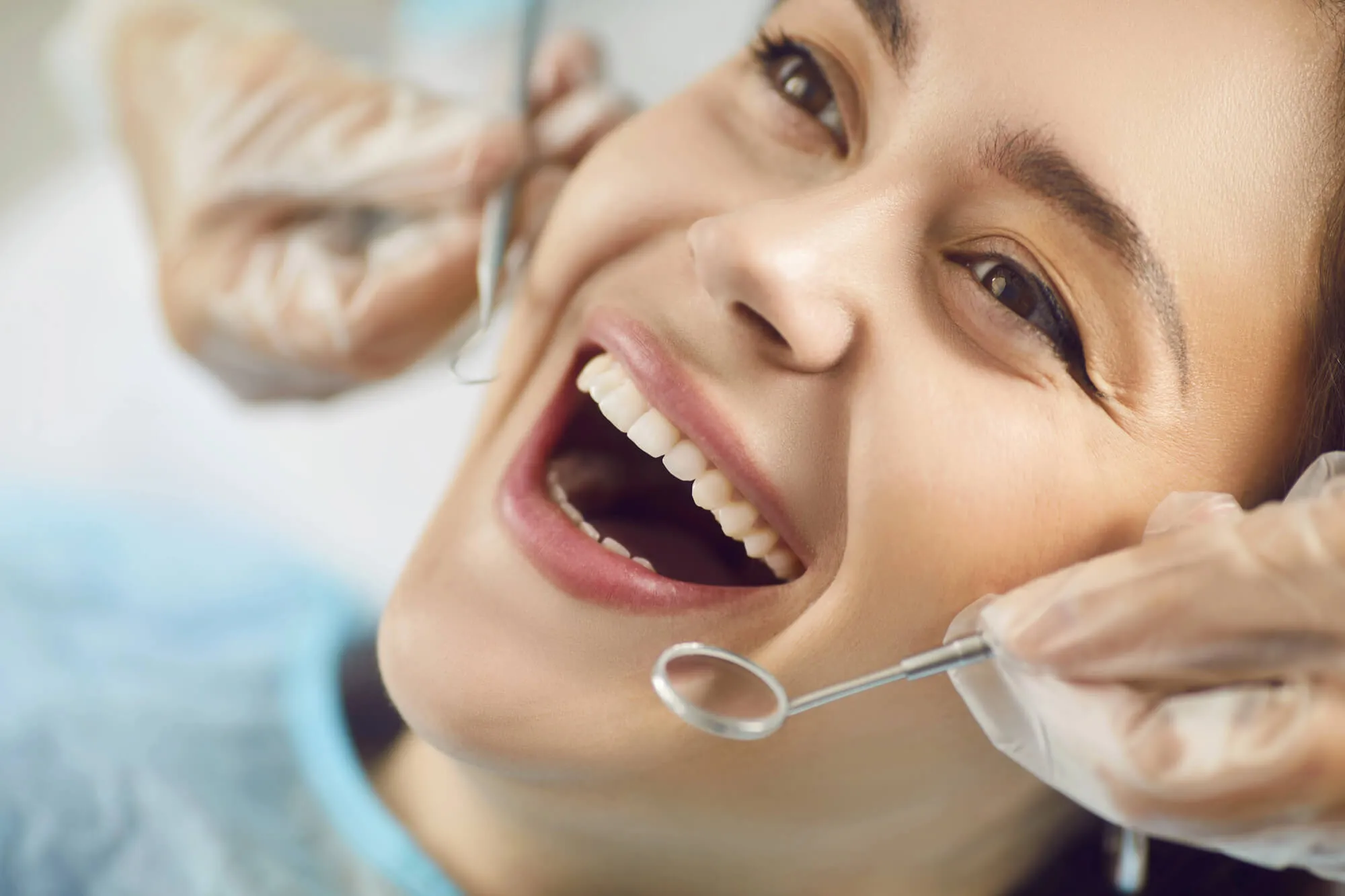 patient smiling at prosthodontist 33431